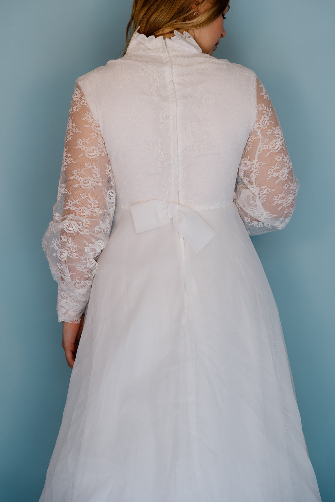 Morris: 1970s white, tiered skirt with tulle, long sleeves wedding dress