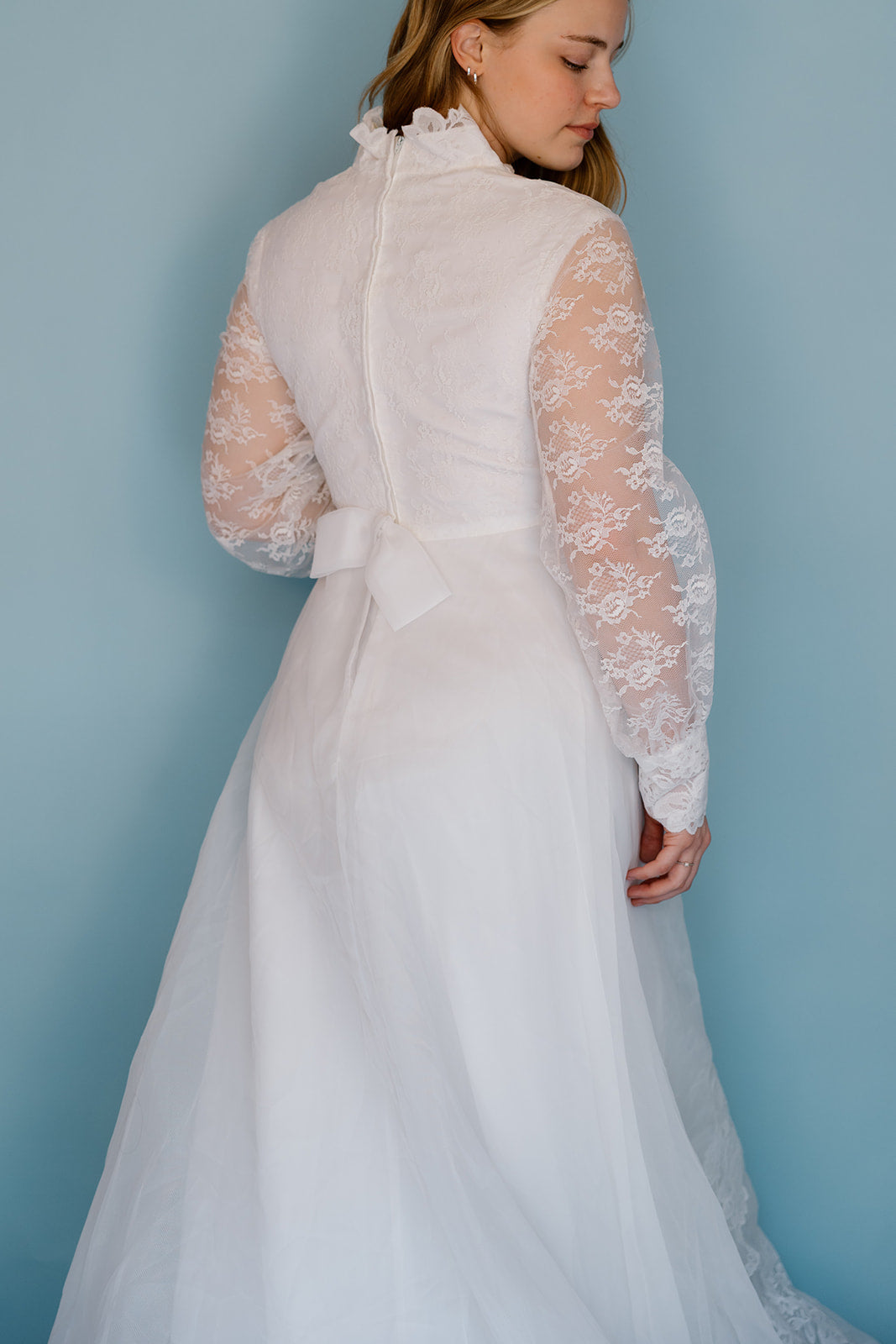 Morris: 1970s white, tiered skirt with tulle, long sleeves wedding dress