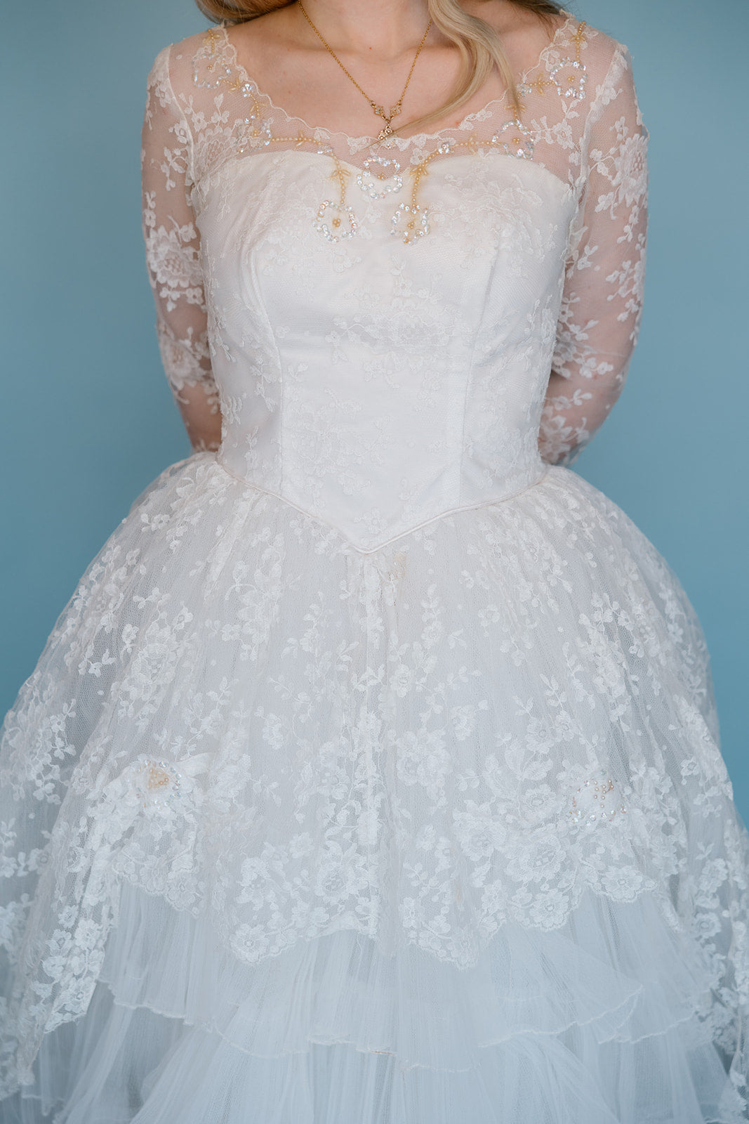 Betty: 1950s ballgown with tiered front and beaded neckline