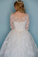 Betty: 1950s ballgown with tiered front and beaded neckline